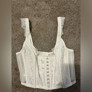 I am selling this because I could never style it right. It has never been worn